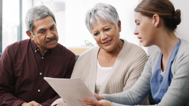 A couple talking with a healthcare professional