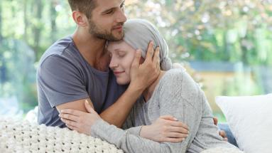 a young man consoling his woman partner