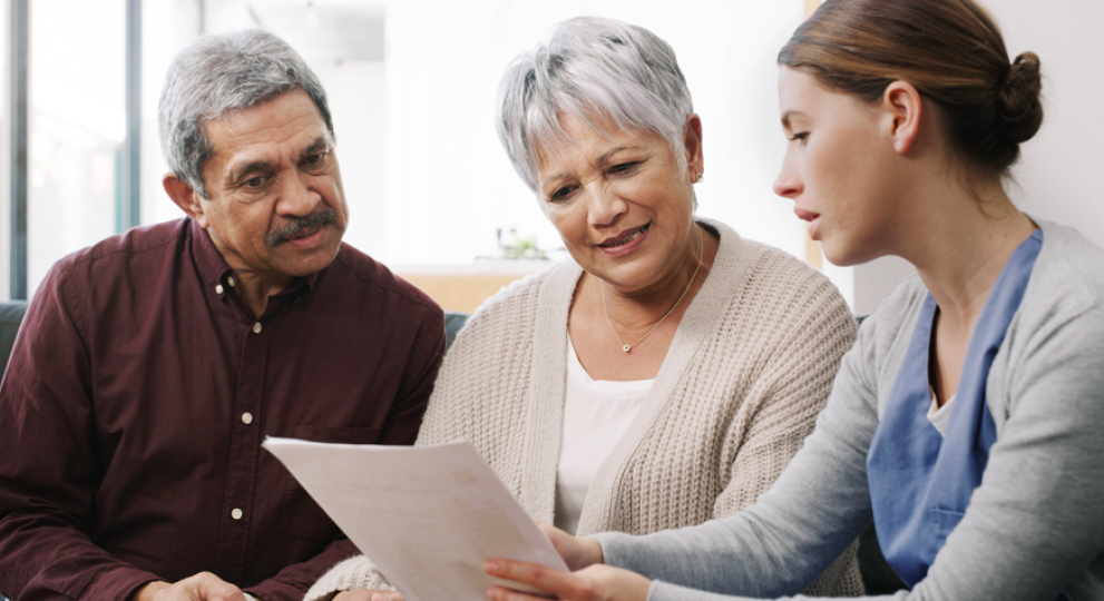 A couple talking with a healthcare professional